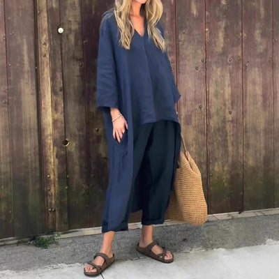 Ensemble 2 pièces femme bleu marine décontracté avec tunique longue et pantalon confortable, style urbain élégant.