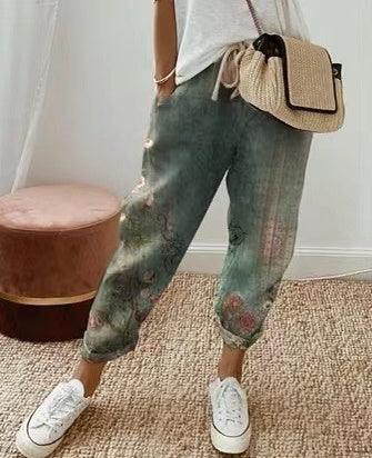 Pantalon décontracté uni vert en coton et lin pour femme, style fluide et confortable.