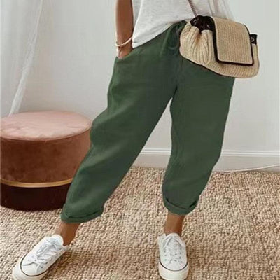 Pantalon décontracté uni vert pour femme, coupe ample et confortable en coton et lin.